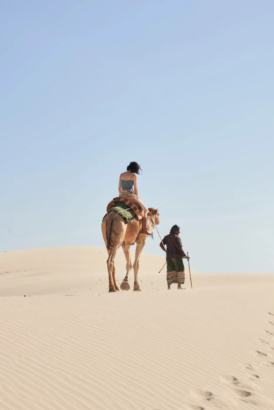 A camel ride across the white sand dunes