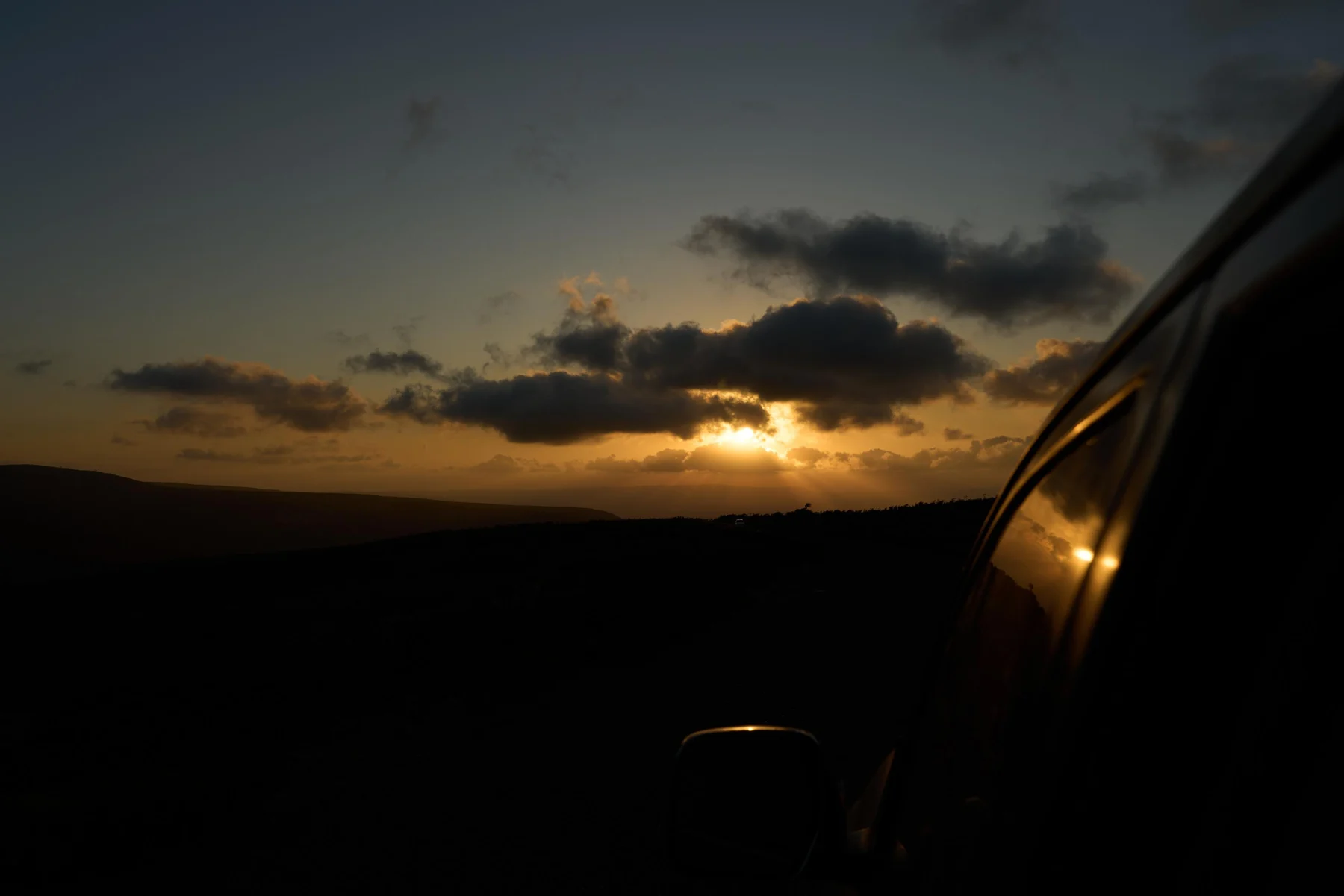 Golden light on the road at the end of the island journey